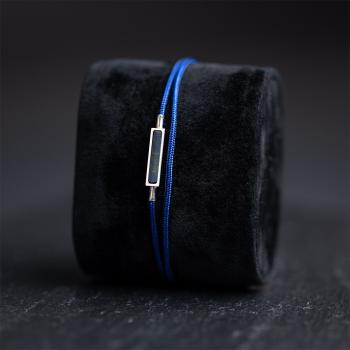 Preview: 1,5 mm blaues Nylonarmband mit einem blauen Tigerauge-Stein - Talis Blue Silver